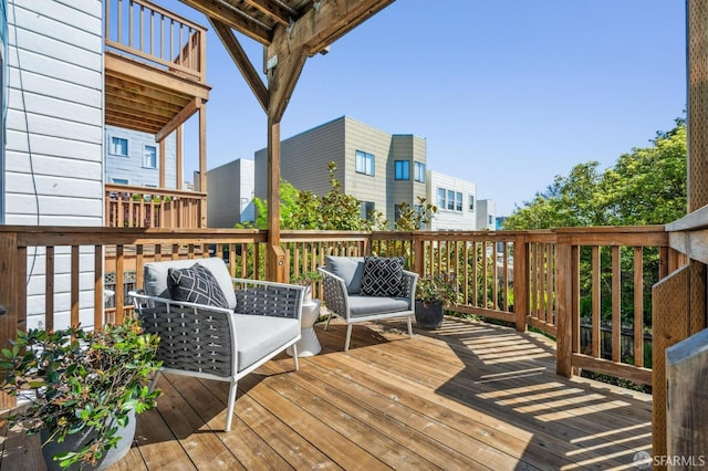 wooden deck with outdoor lounge area
