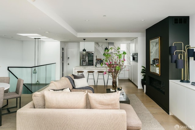 living room featuring light hardwood / wood-style flooring