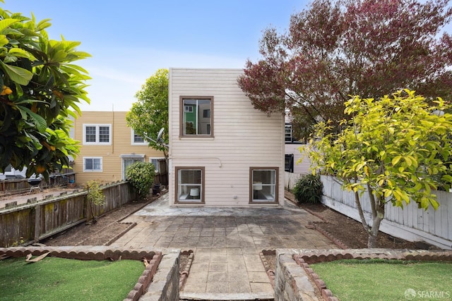 1874 34th Ave, San Francisco, CA 94122 - back of house featuring a patio area and a fenced backyard