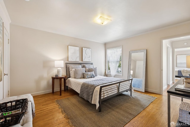 1874 34th Ave, San Francisco, CA 94122 - bedroom featuring light wood finished floors and ornamental molding