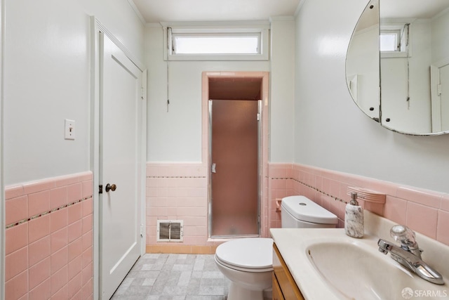 1874 34th Ave, San Francisco, CA 94122 - bathroom featuring tile walls, a wainscoted wall, vanity, and a shower stall