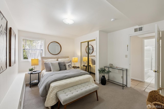 1874 34th Ave, San Francisco, CA 94122 - bedroom featuring light carpet, a closet, and light tile patterned floors