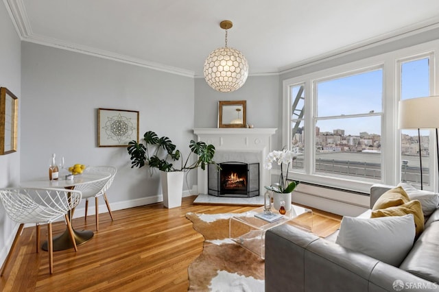 1250 Vallejo St Unit 9, San Francisco, CA 94109 - living room featuring ornamental molding, wood finished floors, and a high end fireplace