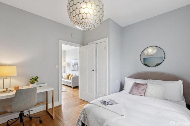 1250 Vallejo St Unit 9, San Francisco, CA 94109 - bedroom featuring an office area, wood finished floors, and a closet