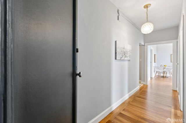1250 Vallejo St Unit 9, San Francisco, CA 94109 - hallway with light wood-style flooring and baseboards