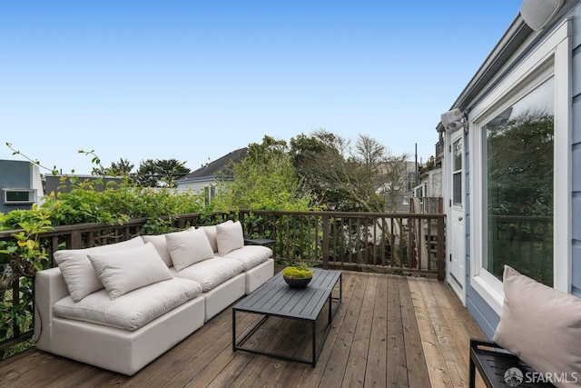 deck with an outdoor hangout area