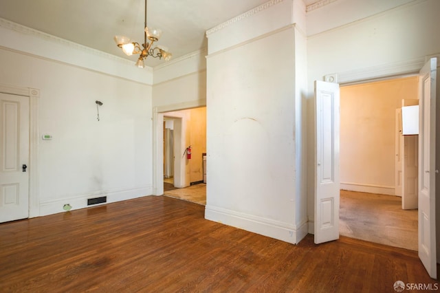 772-774 14th St, San Francisco, CA 94114 - empty room with wood finished floors, a chandelier, and baseboards