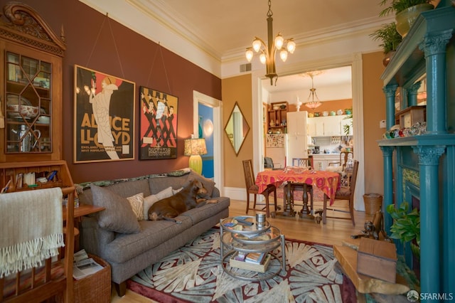 772-774 14th St, San Francisco, CA 94114 - living room featuring a chandelier, ornamental molding, and wood finished floors