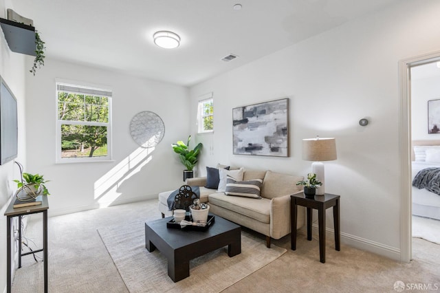 3069 Vittoria Loop, Dublin, CA 94568 - living room featuring light carpet and healthy amount of natural light