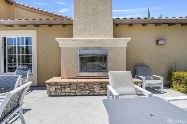 3069 Vittoria Loop, Dublin, CA 94568 - view of patio / terrace with a glass covered fireplace