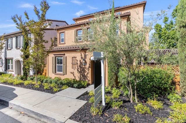 3069 Vittoria Loop, Dublin, CA 94568 - view of front of home with stucco siding and a tile roof