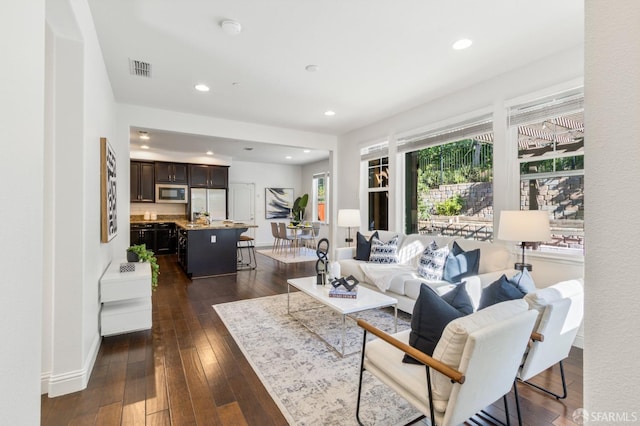 3069 Vittoria Loop, Dublin, CA 94568 - living area with dark wood-type flooring and recessed lighting