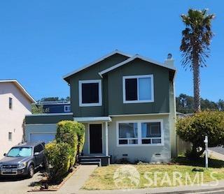 front facade with a garage