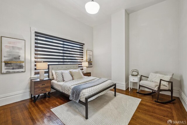 432 Buchanan St, San Francisco, CA 94102 - bedroom featuring wood finished floors and baseboards
