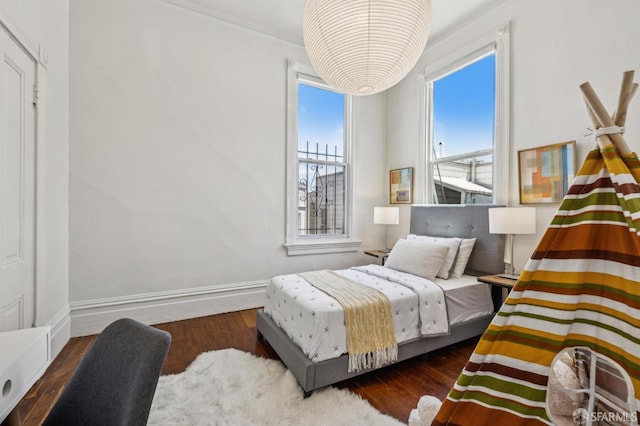 432 Buchanan St, San Francisco, CA 94102 - bedroom with wood finished floors and baseboards