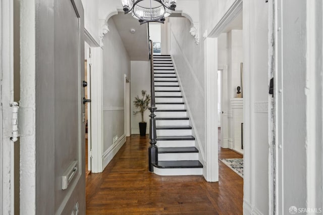 432 Buchanan St, San Francisco, CA 94102 - entryway with a chandelier, dark wood finished floors, and stairway
