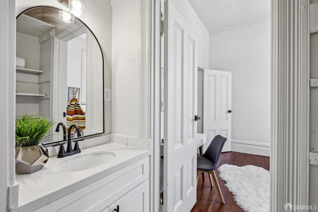 432 Buchanan St, San Francisco, CA 94102 - bathroom featuring wood finished floors, vanity, and baseboards