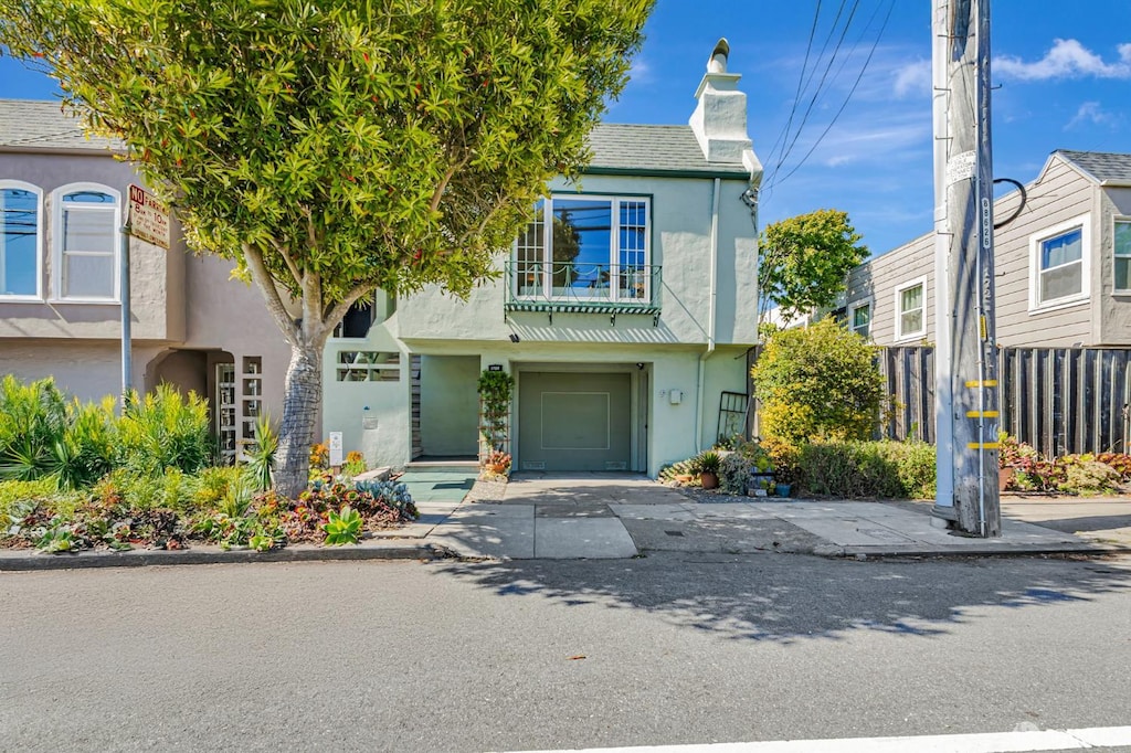 1722 Ortega St, San Francisco, CA 94122 - view of front of property featuring stucco siding and a chimney