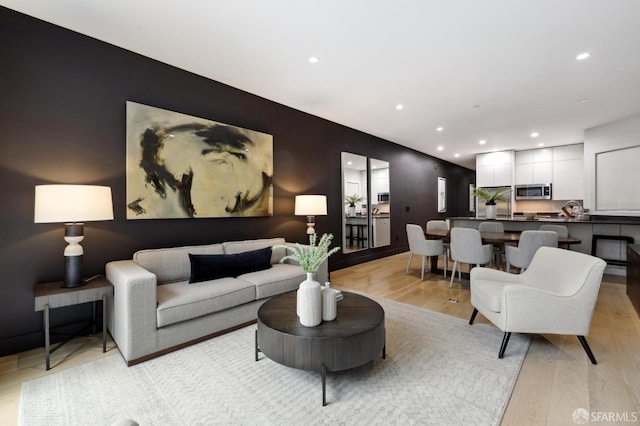 living room with light hardwood / wood-style floors