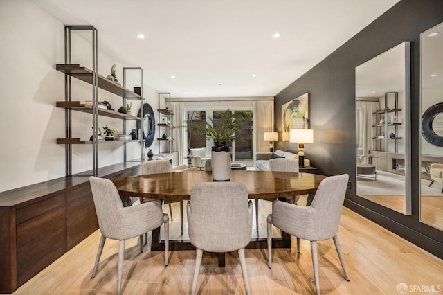 dining room with light hardwood / wood-style floors