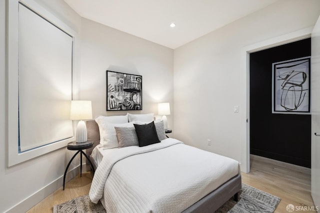 bedroom featuring light hardwood / wood-style flooring