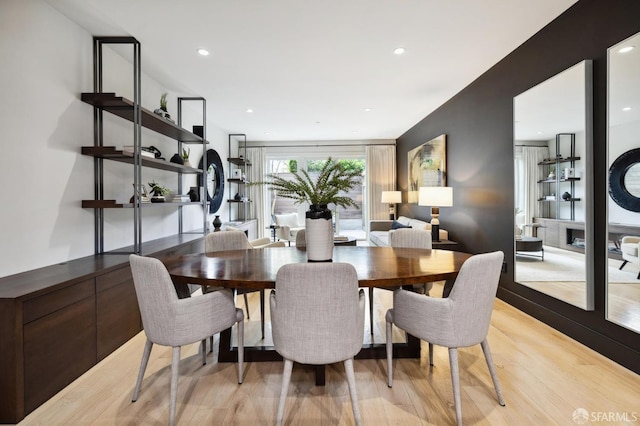 dining room with light hardwood / wood-style floors