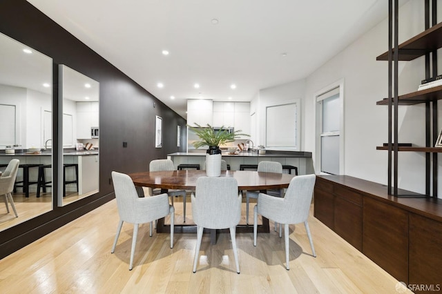 dining room featuring light hardwood / wood-style flooring