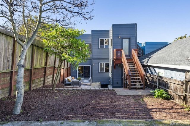 back of property featuring a patio