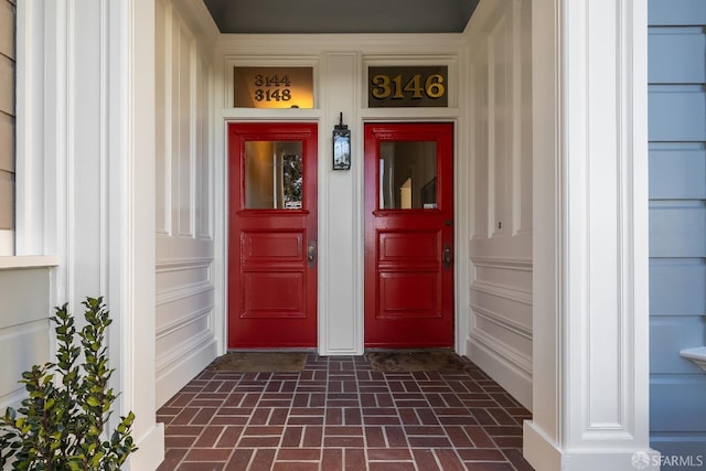 view of exterior entry featuring a garage