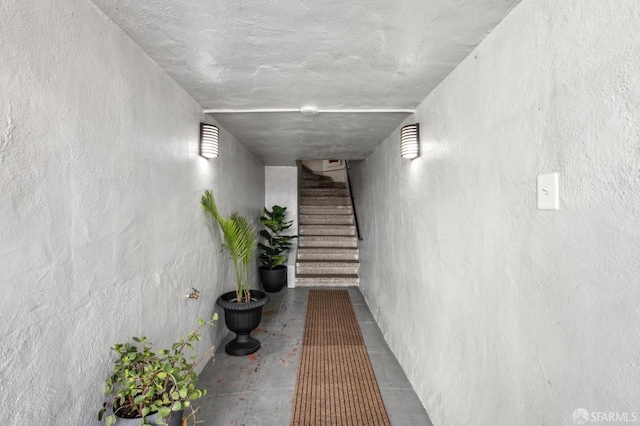 221 Lily St, San Francisco, CA 94102 - corridor with stairway and a textured wall