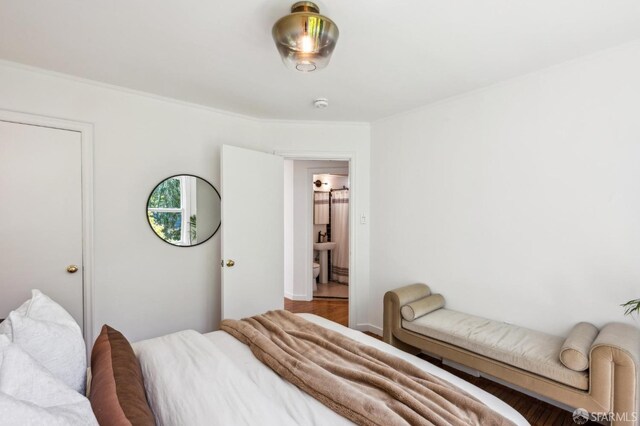 221 Lily St, San Francisco, CA 94102 - bedroom featuring crown molding and wood finished floors