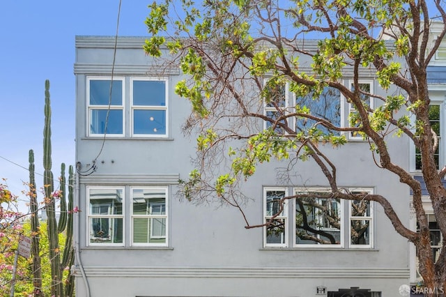 221 Lily St, San Francisco, CA 94102 - view of side of home with stucco siding