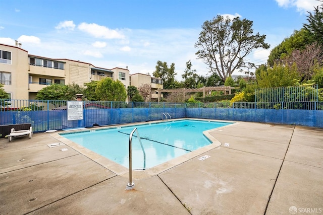 pool featuring fence