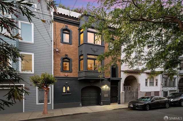 view of front of home with a garage