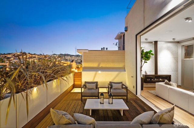 view of balcony at dusk