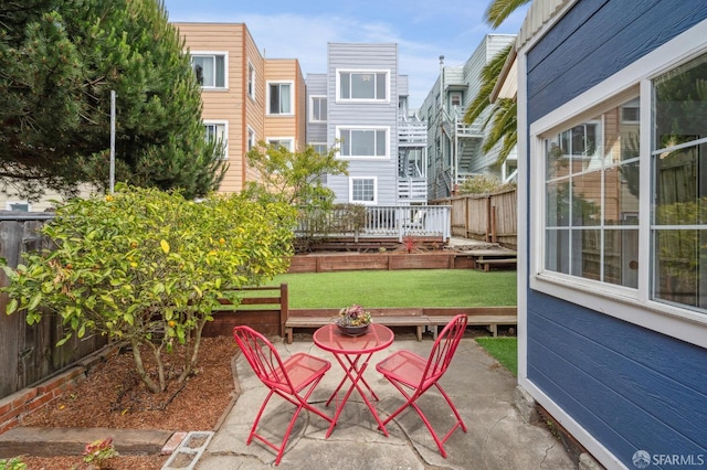 1371-1373 16th Ave, San Francisco, CA 94122 - fenced backyard with a patio