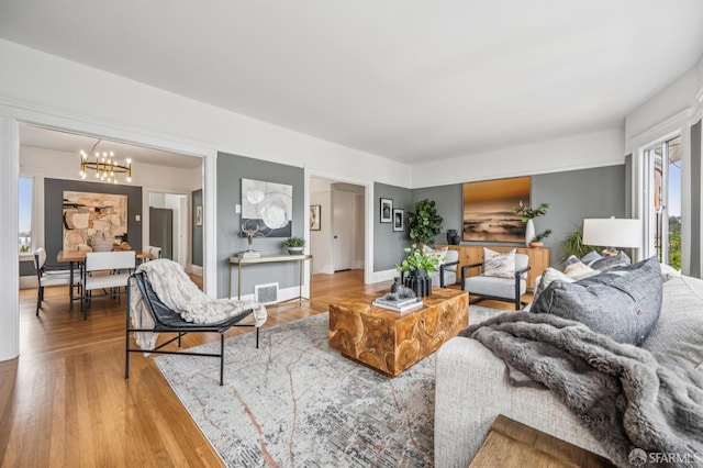 1371-1373 16th Ave, San Francisco, CA 94122 - living area featuring a chandelier and wood finished floors