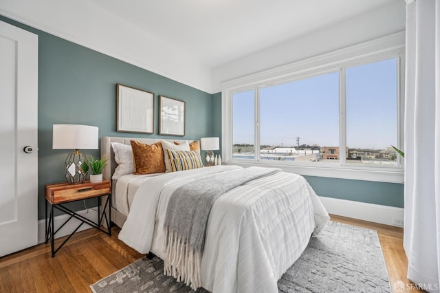1371-1373 16th Ave, San Francisco, CA 94122 - bedroom with wood finished floors and baseboards
