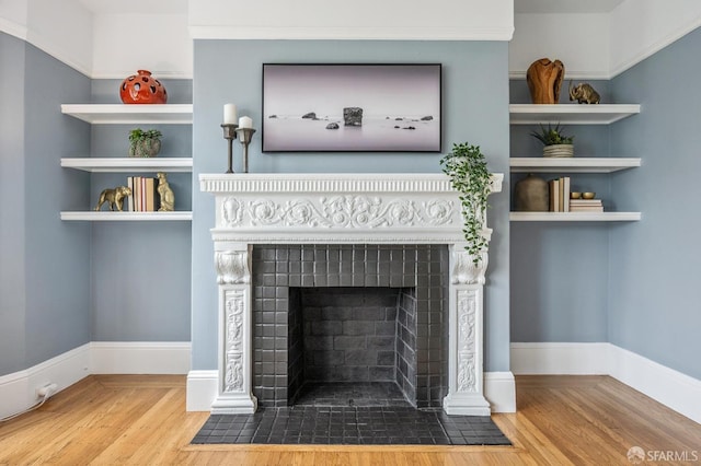 1371-1373 16th Ave, San Francisco, CA 94122 - detailed view of wood finished floors and a fireplace with flush hearth