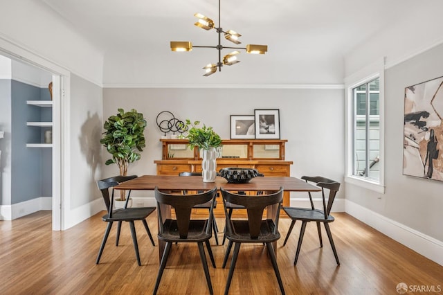 1371-1373 16th Ave, San Francisco, CA 94122 - dining space with a chandelier and light wood-style floors