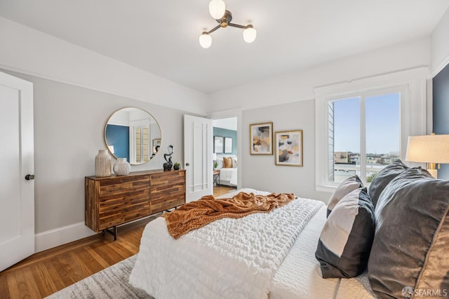 1371-1373 16th Ave, San Francisco, CA 94122 - bedroom with multiple windows and wood finished floors