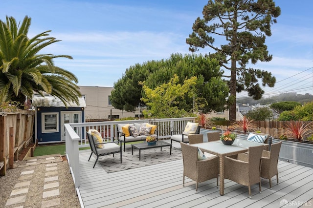1371-1373 16th Ave, San Francisco, CA 94122 - deck with outdoor lounge area, an outdoor structure, and outdoor dining space