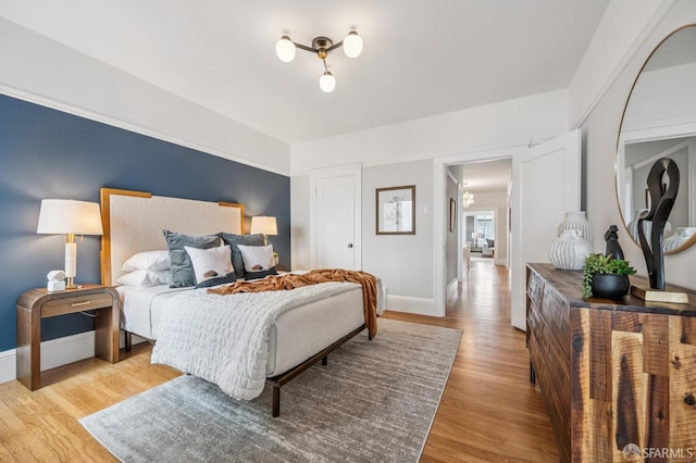 1371-1373 16th Ave, San Francisco, CA 94122 - bedroom featuring wood finished floors and baseboards