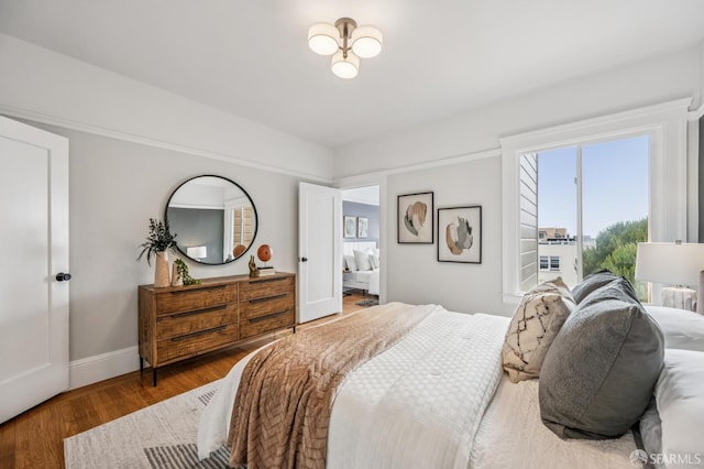 1371-1373 16th Ave, San Francisco, CA 94122 - bedroom with baseboards and wood finished floors