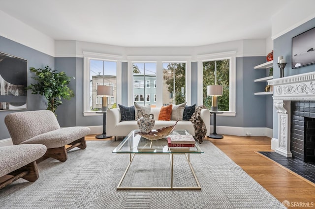 1371-1373 16th Ave, San Francisco, CA 94122 - living room with a fireplace with flush hearth and wood finished floors