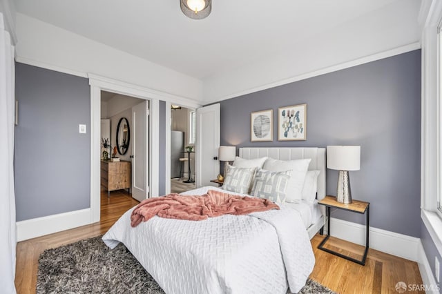 1371-1373 16th Ave, San Francisco, CA 94122 - bedroom featuring wood finished floors and ensuite bathroom