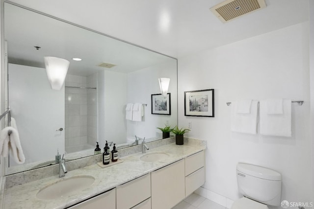 full bathroom featuring vanity, toilet, tile patterned floors, and shower / washtub combination