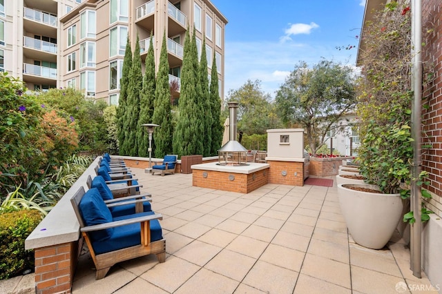 88 King St Unit 104, San Francisco, CA 94107 - view of patio with an outdoor fire pit