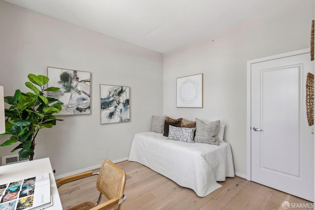 88 King St Unit 104, San Francisco, CA 94107 - bedroom featuring light wood-style flooring and baseboards