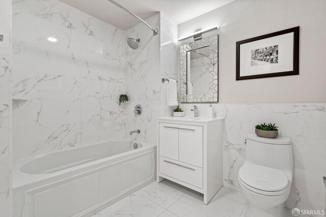 88 King St Unit 104, San Francisco, CA 94107 - full bathroom with vanity, marble finish floor, toilet, and shower / washtub combination